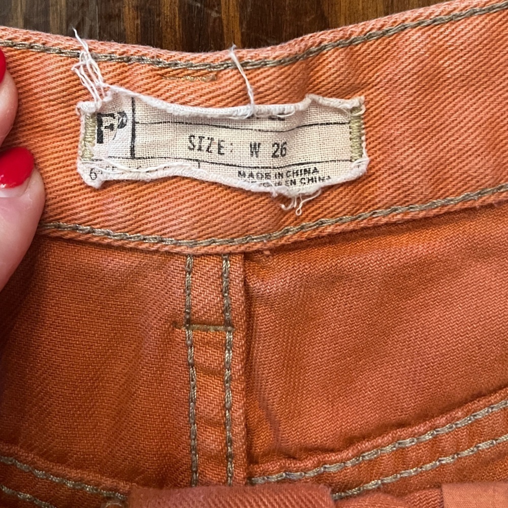 FREE PEOPLE Irreplaceable Tie Dye Orange Cut Off Shorts - Picture 3 of 4
